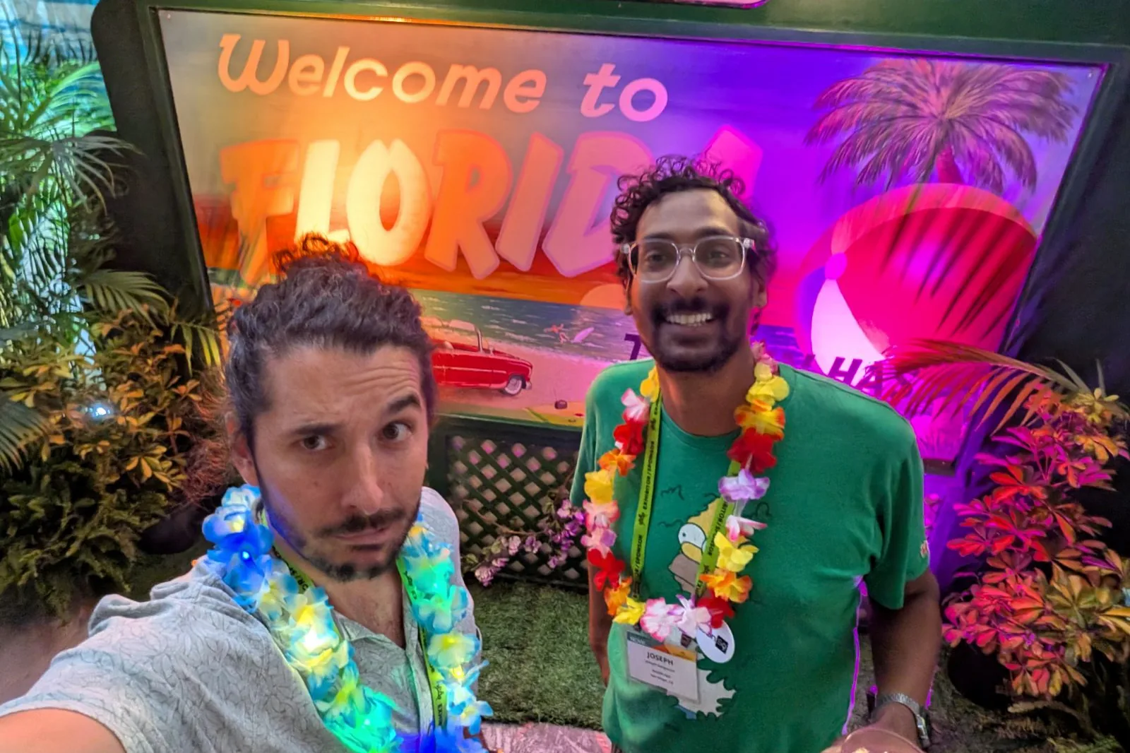 Brian and Joseph in leis at the Welcome to Florida evening event